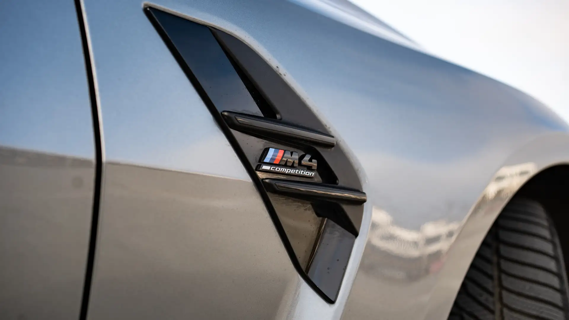 Close-up of the M4 logo.